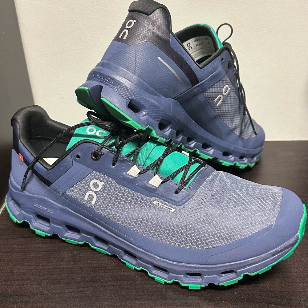 On Running Blue and Green Athletic Shoes with Quick-Lace System